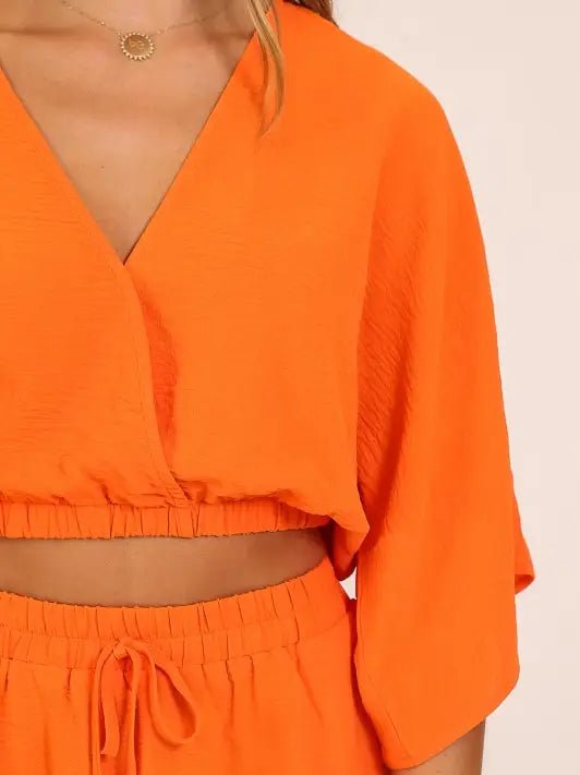 Orange Surplice Airflow Top - Simply Pink Boutique